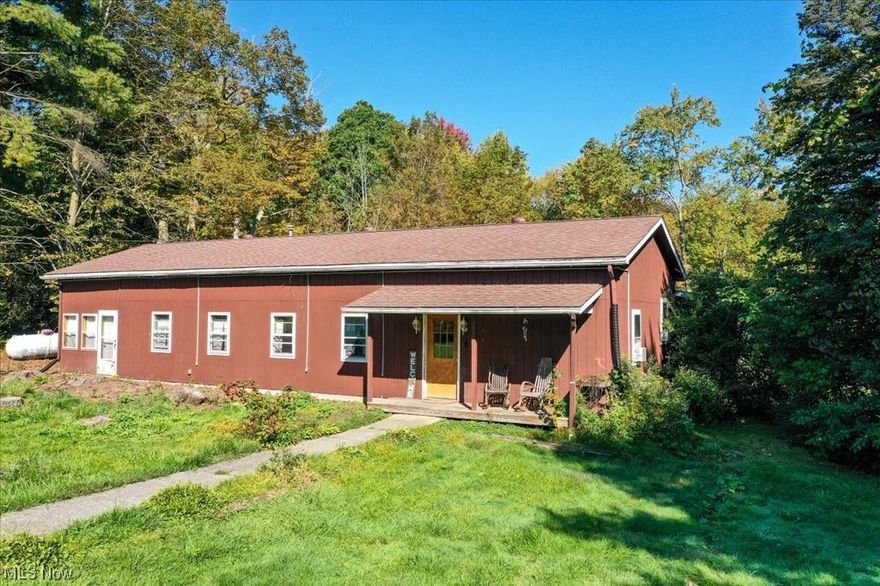 Welcome Home to this stunning 30 acre Private Homestead that has it all. Whether you like to hunt, fish, relax, canoe, hike or ride your horse or ATV, this unique property has 1300 feet of frontage on Mill Creek and over 25 acres of woods. The beautiful pond is home to all kinds of wildlife. Overlooking the pond is a Covered Pavilion covering a camper which has electric service. The 4 bedroom & 2 bath home welcomes many guests. The spacious great room has so many windows to take in the spectacular views. The wood burning stove is perfect for those cool evenings. The inviting partial wrap around deck overlooks the gorgeous creek and abundant wildlife. The opportunities are endless if you are looking for a full time home, or a weekend retreat or a VRBO/Air BNB, or just your own private hunting/fishing destination.