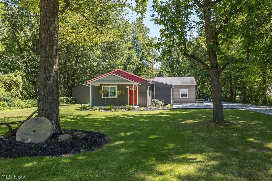 This adorable home is like WOW the moment you pull in the driveway, curb appeal plus.  The current owner has done many wonderful upgrades to this three bedroom one bath Ranch offering almost 1100 sqft.  There is a great living room facing the front of the home, eat in kitchen which has been updated along with the bathroom.  laundry room including the washer, dryer and utility tub plus an adorable mudroom and all of this is on ground level...All of the following upgrades have been done since 2017.  Most all of the windows have been replaced.  Home and garage has been completely vinyl sided.  A concrete porch with a metal roof has been added.  There is a new large two car garage measuring 24 x 24 with 10' high ceilings and a metal roof.  Even though the garage is detached, it appears to be attached...  There is also a great looking barn measuring 12 x 10 and patio which fits into the picture beautifully.  This home is freshly painted and all carpeting and flooring have been replaced.  Al