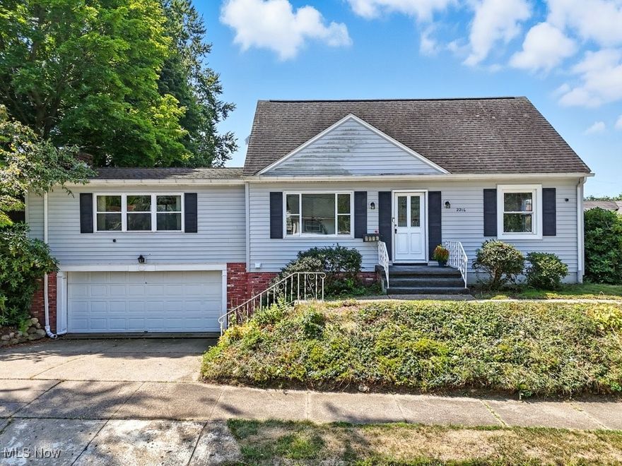 Step into 2216 Eastlawn Ave, a charming and well-kept Cape Cod ready to welcome you home! The bright living room features newer vinyl plank flooring and is filled with natural light with a convenient optional first-floor laundry area. Continue into the kitchen and an oversized family room with a cozy wood burning fireplace perfect for gatherings. The main level also includes a full updated bathroom and two bedrooms with hardwood floors.
Upstairs, you will find a private master suite with two generous closets and a half bath. The full basement offers abundant storage and a bonus room just waiting for your finishing touch. Additional highlights include an attached 2-car garage with lower level entry, a fenced backyard, fresh paint, new flooring, plus a new furnace (2023) and A/C (2024).