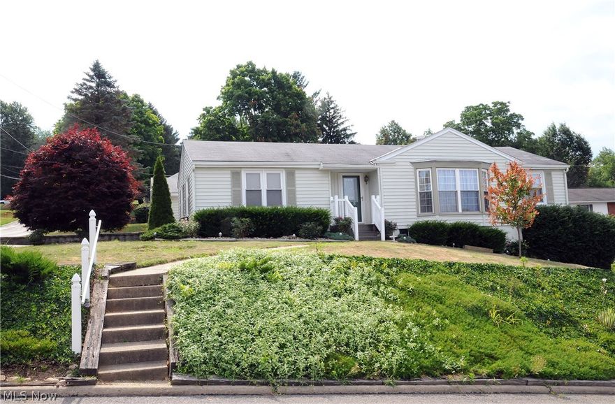 Excellent condition! Convenient floor plan with large living room, 2 full updated baths, fully appliance kitchen & 1st floor laundry.  Beautifully landscaped lot.  Spacious 2 car garage & off street parking. Great location close to schools & city  park.  Homestead exemption $428.94.