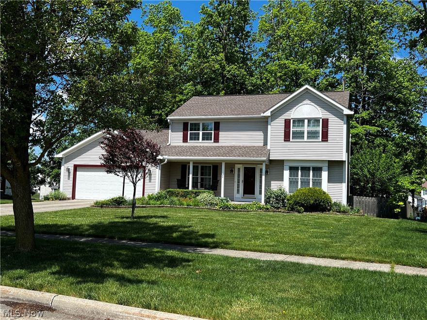 Beautiful colonial in Ashton Woods Estates which sits on a gorgeous park-like wooded lot.  There's so much to love here! The first thing you'll notice as you pull up is the 5x22 covered front porch, perfect for enjoying breezy spring evenings.  As you enter the foyer, you'll find a perfect home office to the right and a formal dining room to the left. Step in further into the gourmet kitchen with island and spacious family room which overlooks an amazing back yard space with 16x25 deck. Imaging summer entertaining here! The upstairs features 3 large bedrooms all with walk in closets...something you don't find often.  Furnace and air were replaced in 2020, and all appliances are included, and the 2+ car garage has a section that is extra deep for additional storage. Make your appointment to see this wonderful home today.