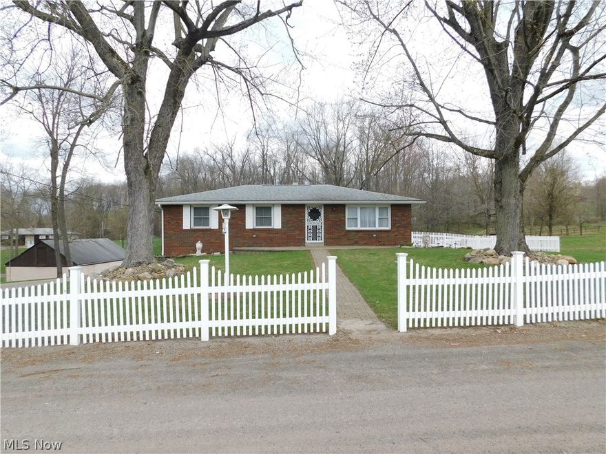 This three bedroom, three bath ranch home is absolutely pristine! Enjoy the year round 28 x 26 sun room right off of the kitchen and dining area! Enjoy your morning here or out on the deck. There is a forth bedroom in the basement and storage galore! Four garages!! Beautiful landscaping! This home is just beautiful!