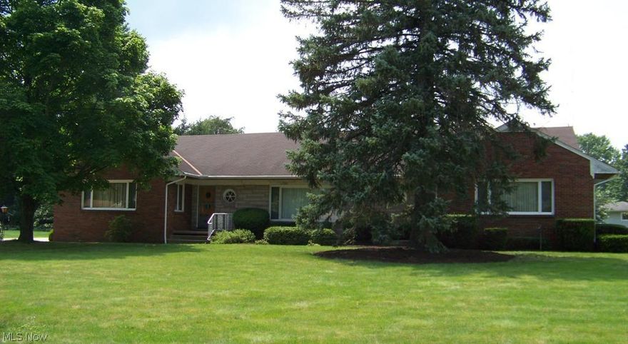 Are you looking for a home where you will not run out of space? Check out this 3,748 sqft all brick ranch home with an enormous full basement nestled in one of Warren best secluded neighborhoods. You are welcomed in by the spacious foyer which leads you into the great rm that has wood burning fireplace and beautiful hardwood floors. The kitchen has plenty of room for several cooks at the same time, an abundance of cabinets, and an eating area. Overlooking the front yard with its picture window is the family rm. Just down the hall is the private area where the 4 bedrms are located. The master suite has his & her walk-in closets with attached additional mini closets, and a full bath. The next 2 bedrms are connected by a shared full bath. All of the closets in the bedrms are cedar lined. The entire first floor has spectacular hardwood flooring. Don't get lost in the basement. It is divided into a rec rm with fireplace, wet bar, a prep rm and half bath. There is also a laundry rm, workshop