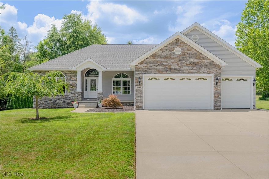 Nestled in a prime location near Walsh University, shopping, and delightful dining spots, this charming three-bedroom, two-and-a-half-bathroom ranch, built in 2009, offers just under 1,800 square feet of thoughtfully designed living space on nearly half an acre. As you arrive, you’re greeted by a well-kept yard and charming curb appeal. Step inside to an open-concept layout filled with natural light, featuring a cozy living room with a gas fireplace and vaulted ceilings that flow seamlessly into the formal dining area and a fully applianced kitchen. The kitchen boasts granite countertops, ample cabinet space with under cabinet lighting, bar-style seating, and a cozy eat-in dinette area. With only one owner, this home has been meticulously maintained. The bedrooms are equipped with ceiling fans and built-ins in the closets, while the master suite is positioned on the opposite side of the house from the other two bedrooms. The master features a walk-in closet, double vanity in the master bath, a tub and shower, and direct access to a covered patio off the rear of the home. Additional conveniences include a first-floor laundry room with built-in cubbies, a powder room/half bathroom, and a heated three-car garage with hot and cold water, a wash tub, and bonus storage above. The home is equipped with a whole-house audio system, that also extends into the garage. While it has public water and sewer, there’s also a water softener for added comfort. The full-length unfinished basement, complete with an egress window, offers endless possibilities for customization. This lovely home truly has it all! You do not want to miss your opportunity to call it yours! Call today to schedule your private showing.