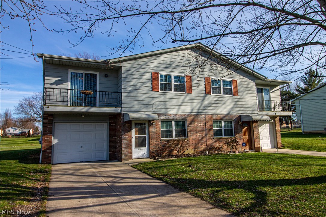 Duplex with an inground community pool. Each unit has 2 bedrooms, 1 full and 1 half bath, and single bay garage. Newer roof and gutters, HVAC, carpet, bathrooms, driveway and parking pad. Great opportunity for investment or help defray mortgage with rent. Ideally situated near I-71 and shopping.