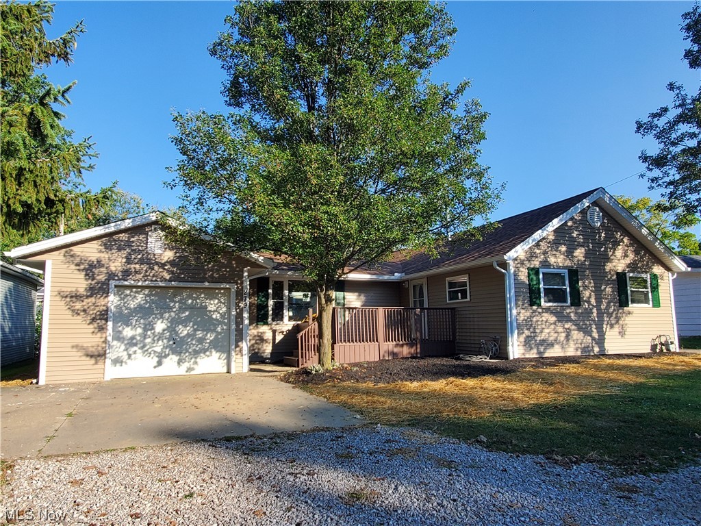 A HARVEST OF UPDATES is in this lovely ranch at Vermilion on the Lake - NEW: siding, roof, gutters, windows, most flooring, furnace and A/C, electric panel, most plumbing, hot water tank and freshly painted throughout. On top, from the sidewalk you can see the lake to your right! The entry hall provides access to the family room, bedrooms, and kitchen. The large, friendly eat-in kitchen also features a space that could be used as a walk-in pantry. The 3 seasons-room leads you to the kitchen and the backyard. The family room is big enough for any occasion. Hard flooring throughout the house. Laundry and full bathroom on main floor. Half bathroom is in basement. Long garage with workbench AND a paved driveway on the side of the house. Opportunity is knocking! Call your Realtor and come to buy this one :) Immediate possession. Measurements are approximated.