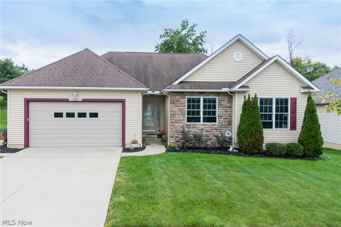 Extremely hard to find newer ranch home in Hudson Schools, under 300k! Situated on one of the best lots in the development - fall in love with the modern open floor plan, spacious room sizes, tasteful decor and private back yard! The kitchen features granite counters, upgraded cabinetry, and high end laminate flooring through the dining area and foyer. The great room offers a soaring vaulted ceiling and gas fireplace w/stone front. Master suite is complete with dual closets (one walk-in), double vanity, soaking tub and walk-in shower. Two other ample bedrooms, a full bath, and first floor laundry complete the main level. Out back you will find a truly private setting, complete with large yard and deck for entertaining, gazebo on deck can stay! Finally the finished lower level is complete with theater area, space for recreation/workout/billiards, a neat half bath, and additional storage space. Put this on your must-see list today!