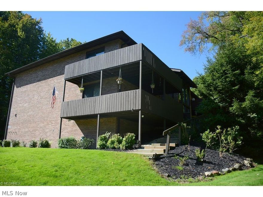 A place to live for the best of your life....Enjoy the views from your wrap around deck overlooking the heavily treed wooded area.  Super sharp remodeled kitchen with corian countertops and tons of cabinets.  Newer flooring and appliances. Storage pantry and additional cabinets in laundry room.  Three large walk in closets in the bedrooms.  Freshly painted through out this spacious ranch.  Master suite features a dressing area and half bath.  Wooded views from most windows.  Newer windows and doors.  Unit has a large storage unit and one car garage. Must see inside!