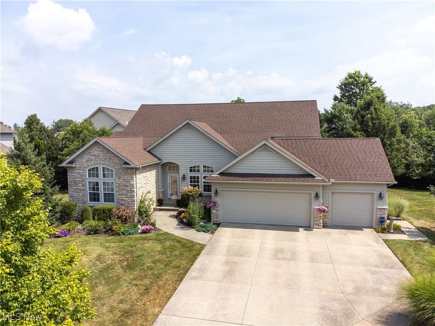 Welcome to this beautifully designed custom ranch in the highly desirable gated community of Sterling Lakes, offering the ease of one-floor living and a rare combination of space, style, and location. Perfectly positioned on a quiet cul-de-sac, this light-filled 3-bedroom home features an expansive great room with soaring vaulted ceilings, a dramatic floor-to-ceiling stone fireplace, and stunning two-story windows that fill the space with natural light. The open-concept dining area is ideal for hosting, while the kitchen is outfitted with granite countertops, ample cabinetry, and a cozy breakfast nook. The spacious primary suite includes a luxury bath with dual vanities and a soaking tub. Two additional bedrooms and 3.5 total baths—including a full bath in the finished lower level—provide flexible living options for guests and family. The home office/den could also be used as a 4th bedroom. A generous laundry room is located just off the kitchen for added convenience. The large finished basement offers abundant storage and additional living space, ideal for recreation or entertainment. Recent updates add tremendous value, including a brand new high-efficiency Trane A/C unit (installed June 2024, with 10-year parts and compressor warranty), a new inducer motor assembly for the furnace (October 2024), and full exterior repainting completed in July 2025. An EV charging plug has also been added to the fully finished, heated, and tiled 3-car garage, truly a rare and desirable feature in the community. Enjoy unparalleled convenience with close proximity to popular shopping centers such as Eton and Village Square, including Trader Joe’s and Target. This thoughtfully maintained home combines comfort, elegance, and practical updates in one exceptional package.