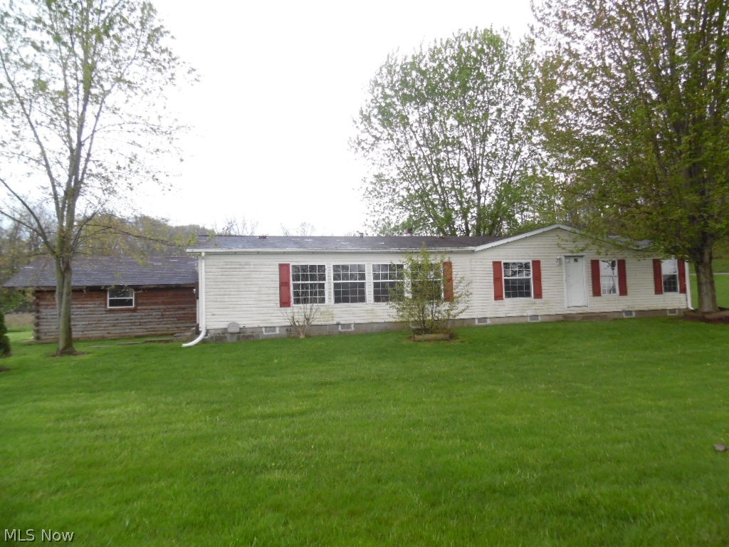 Must See This!!!! Beautiful country setting home with 3 bedroom and 2 full baths. A large master bath with double sinks, garden tub and shower, a big walk in closet. A long kitchen and dinning area. A large living room with a fireplace in the corner and a sliding glass door that goes out to a deck. A nice large flat backyard with a big shed and shelter. Has a large pond that needs some maintenance.