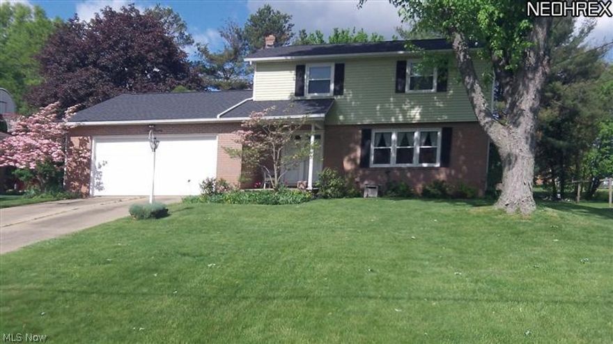 Beautifully maintained 2 story colonial.  Four bedrooms, 1 1/2 baths.  Formal dining room with sliding doors accessing a large deck.  Spacious family room with fireplace which leads to a sunroom that overlooks a private back yard.  Large, fully applianced kitchen with island.  Beautiful hardwood floors in bedrooms.  Partially finished recreation room in basement.  This quality home is a must see.