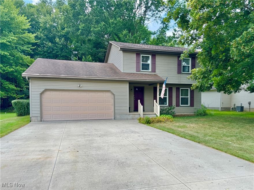 Welcome to this charming 3-bedroom, 1.5-bath home located in the Canfield School District. Inside, you’ll find a spacious living room with original wood floors under the carpet, a bright dining space with built in cabinetry, updated kitchen with Corian counter tops. A half bath and large family room with slider to the composite deck complete the first floor. Upstairs you will find the three generously sized bedrooms with original wood floors and full bath. The partially finished basement offers plenty of storage and room to create a rec room or whatever you desire. There is a two car attached garage, and outside, enjoy a front porch and back deck overlooking the private backyard with plenty of room for outdoor activities. This move-in ready home features a updated kitchen, newer vinyl double hung windows, and HVAC, ensuring comfort and efficiency year-round and a new concrete driveway.
With its prime location near shopping, restaurants and entertainment, thoughtful updates, this home is an incredible find—schedule your showing today!
