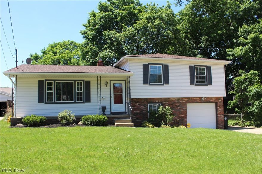 Welcome HOME! Wooded, fenced in-back yard offers privacy and peaceful oasis. Walk out concrete patio from family room. This immaculate spacious 3 bedroom and 2 full bath split level home has many updates!! Featuring warm tones throughout.  Updates include: New roof approx. 2007. New windows 2003. Hot water tank 2013. Kitchen counter tops & sink 7/15. Garbage disposal 2012. Most of all the light fixtures & ceiling fans replaced in 2014. New carpet 2019.  Custom blinds. Basement offers plenty of storage space. Close to freeway access, shopping, schools & recreation. Call for your showing today! Interior photos will be posted by Sunday afternoon