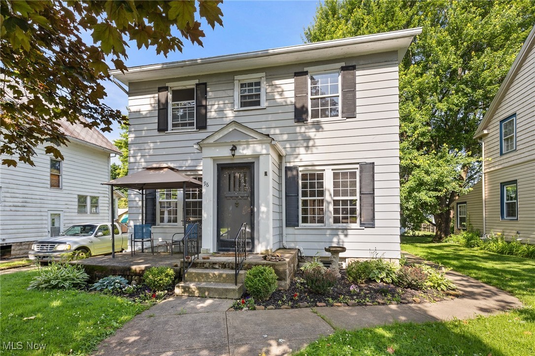 Step into this two-story Colonial nestled along one of Mansfield's historic boulevards. Freshly painted throughout and boasting refinished hardwood floors, the interior shines with natural light and warmth. The spacious main level flows from the inviting living room to the formal dining area, ideal for entertaining. Upstairs, you'll find 3 bedrooms and a full bath, while the finished attic offers a versatile bonus space; perfect for a home office, guest suite, or creative studio. Enjoy your private backyard retreat, offering plenty of space for gardening, relaxation, or play. A detached garage adds convenience and extra storage. Located minutes from downtown, parks, and schools, this home is an opportunity to own a piece of Mansfield history updated for modern living.
