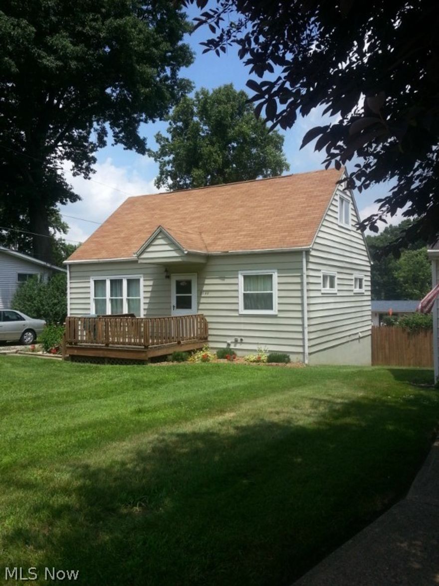 Move right into this charming 4 bdrm., 1 1/2 bath bungalow.  Neat as a pin with light neutral colors.  Walk out basement with great potential to finish for extra living space.  Most updates done in early 2000 include:  roof, windows, furnace, air.  Hot water tank in 2014.  Exterior painted aluminum siding.  2 storage buildings.