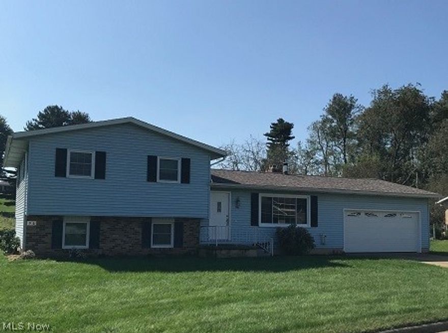 Move right in to this nice family home in a great location! Home offers 3 bedrooms, 1.5 baths and a spacious kitchen with tile flooring and stainless steel appliances. Living room off of dining area and in the lower level is a nice-sized family room. The lower level is partially finished for more living area. Three bedrooms upstairs with an updated full bath. New flooring in the laundry room with a large closet and washer/dryer included. There is a water well on the property for watering the lawn and garden. 2-car attached garage. Cement patio with pergola in the back yard. Many updates were made approximately 6 years including roof, windows, doors and gutters. Some new flooring and paint. Home qualifies for 0% down loan and a one-year home warranty is included.