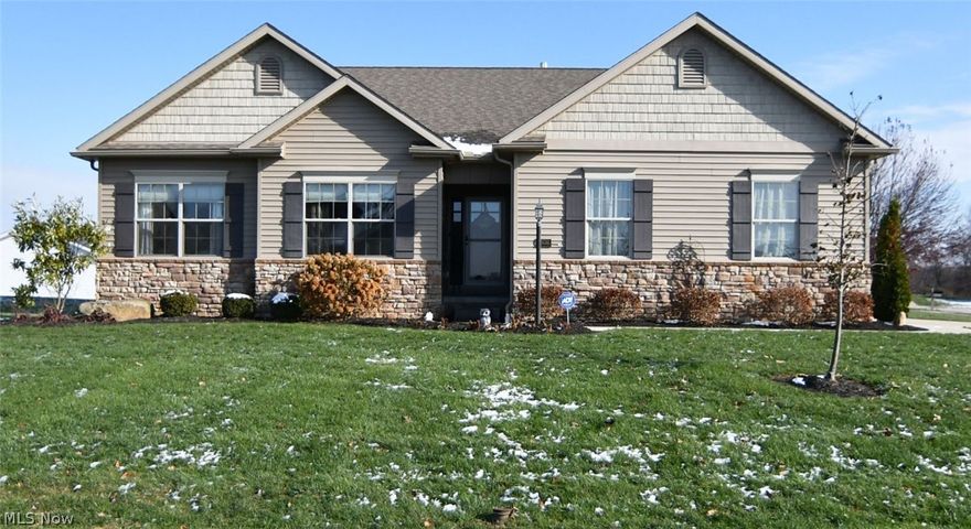 Busy lives lead to easy living at 6976 Emerald Cove Ave NW Jackson Twp. Gorgeous 3 bedroom villa built by award winning Smith  Homes! Foyer entry opens to the generous great room featuring a gas fireplace. Dream kitchen offers granite counter tops, stainless steel appliances,center island with a breakfast bar, and a huge walk-in pantry. Large master bedroom with walk-in closet and adjoining bathroom suite. Two additional bedrooms and a second full bathroom. First floor laundry and a half bathroom complete the living space. Privacy fence surrounds the deck and is accessed through the dining room sliding glass door. Full basement offers many possibilities of  additional living area. Development provides a club house, in-ground pool, pond, tennis courts and walking path. Very walk-able neighborhood with sidewalks and street lights.