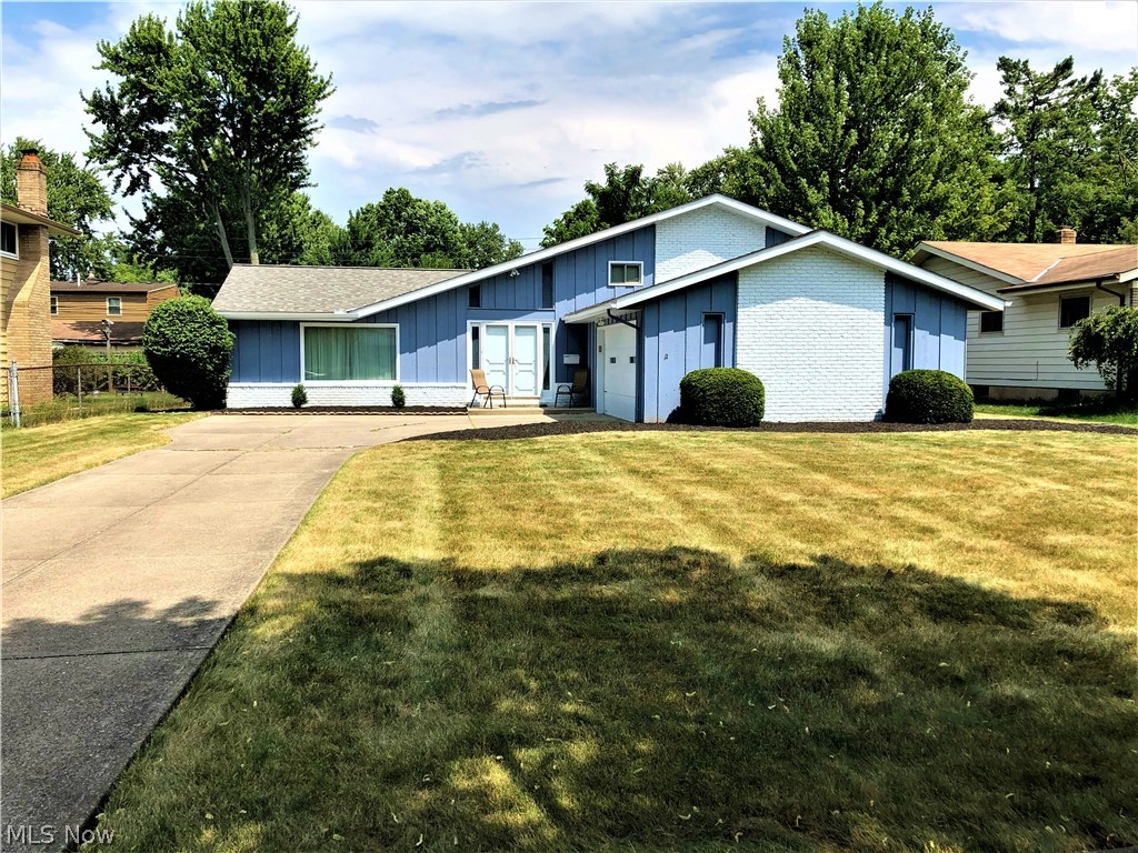 Large split level in desirable North Olmsted neighborhood is ready and waiting for you to call it home. Get development living without the HOA fees in this private neighborhood. Walking in the front door opens to the large living area, with a formal dining room and eat in kitchen. The lower level is a massive family room with fireplace and sliding door to the beautiful patio surrounded by bricks. Upstairs you’ll find four large bedrooms all with great closet space for your family’s wardrobe. The master has ample room for a king size bed along with great space in the master bathroom. The roof has been redone within the last 10 years, the hot water tank is brand new and the exterior of the home was recently painted. A large, fenced in back yard with privacy bushes makes this back yard perfect for entertaining. This great location is minutes from Great Northern Mall and other shopping needs. Bundle that along with close highway access, and you’ve got yourself a must see home! Schedule you