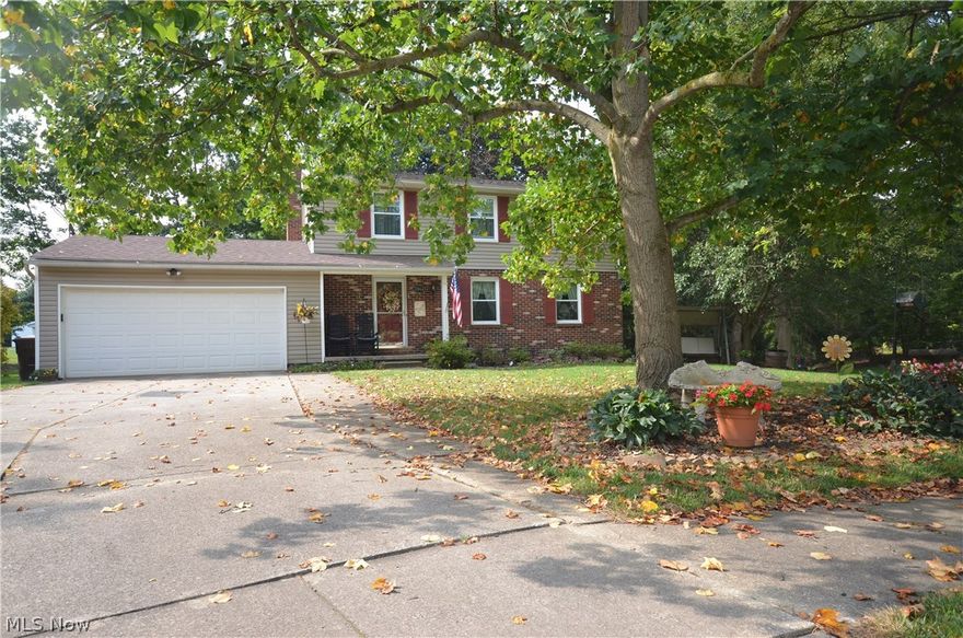 Cul-de-sac location – yet close to schools & amenities- plus big tickets (Roof, Furnace, A/C, Windows, Vinyl Siding, HW Tank, Flooring & More) already updated! Family rm w Brick Gas Fireplace w Wood Mantel & access to the 3 season Sun Rm & Updated kitchen w beautiful Laminate wood floors, High End Laminate Counters w rounded edges for a natural stone look & tile backsplash w mosaic accents compliment raised panel cabinets, desk area w corner glass display cabinet & 2 pantries- one w rotating storage. Open to the eating area w breakfast bar, skylight & Anderson Slider to the Sun Rm. Formal Dining open layout to the big living rm- all w updated carpet plus a 1st flr ½ bath.  Upstairs Master Suite w full wall closets & Updated Private Master bth w wainscoting, updated flooring, vanity, storage cabinet & fixtures. Very spacious bedrooms- including bdrm #2 w full wall closets & recessed area for dresser/desk. Full bath w updated flooring, vanity w drawers & a shower/tub.  The finished basem