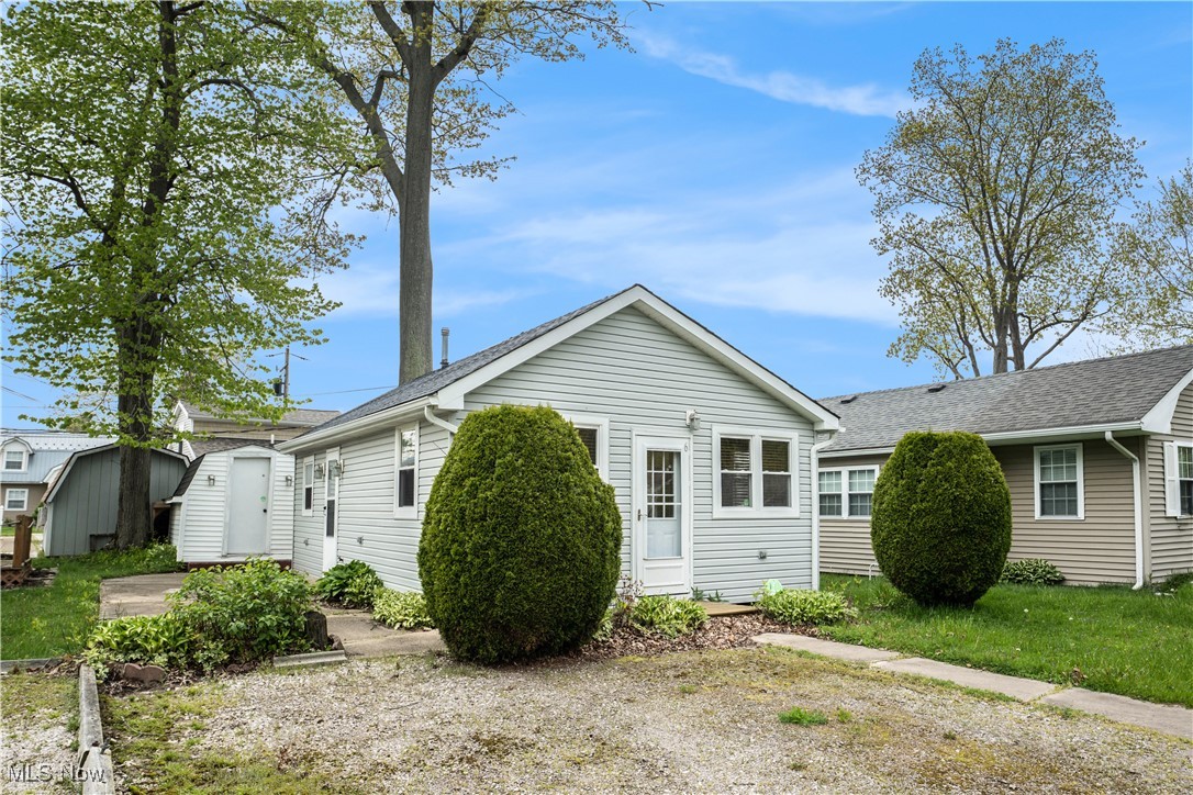 Looking for that cute summer cottage with Lake Erie access? Check this out!! Unique Camp on the shores of Lake Erie. Fully furnished 1-2 bedroom cottage. Patio and storage shed out back. Stairs lead down to private beach owned by members of Ravine Camp Corporation. Camp is open/water turned on from mid-April through end of October yearly. This is not a typical sale - no deed or title. Buyer will be purchasing membership into Ravine Camp Corporation and cottage. You are responsible for maintenance of the lot. Cash Sales Only. The land is owned as a whole by the corporation. Updates to the cottage- updated bath, exterior doors and some windows (3 years), flooring (4 years), Electrical panel, and line from pole (2024) updated exterior lighting (7 years), plumbing (4 years). Attic propane furnace (tank will be needed), window a/c unit and laundry hookups in unit. If you are looking for a summer hang out at the beach, don't miss this opportunity. $500 new member fee is due to any new member of Ravine Camp Corporation. Rentals of any kind are NOT permitted in Ravine Camp Corporation. Saybrook Township park is 1/3 of a mile west, 5-miles to Geneva On The Lake, 4-miles to Ashtabula Harbor District and public beach. Launch your boat at either Geneva State Park or Lakeshore Park. All 5-6 miles away. Ashtabula County offers loads of wineries, beautiful beaches, restaurants, entertainment and more. Gated camp - appointments required.