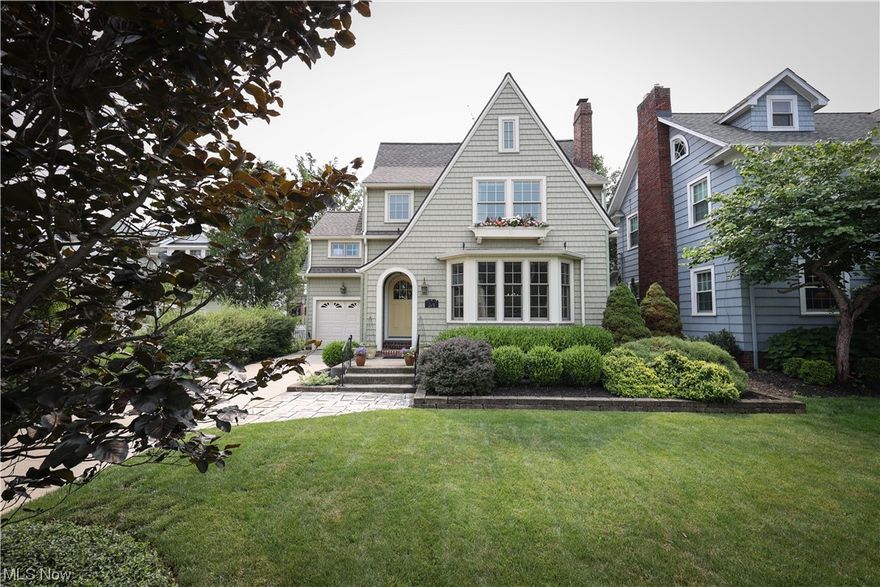 According to Cleveland Magazine, Rocky River is ranked as one of the top 20 suburbs in the Cleveland area in 2023. Come view this charming home nestled in the quaint Beach Cliff neighborhood of Rocky River and just a few steps away from your own private Oakwood beach (residents only) area.  This home's Custom-milled rounded entrance door coordinates with all the sophisticated round-topped doorways throughout. Built-in cabinets in the living room and dining room along with beautiful oak wood floors. 2nd floor features 3 beds and 2 full baths (one newly built with a skylight and heated wood floor). Watch the stars from your beautiful enclosed porch. The many improvements include some newer Pella windows, newer siding, a new roof (warranted), and a new driveway. the home is freshly landscaped both front and back. A One-year home warranty is included.