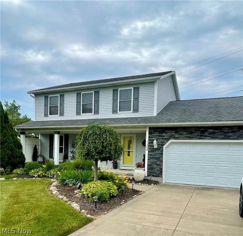 Do not miss out on this fantastic opportunity to own a beautifully updated home in the Tallmadge Highlands neighborhood. This home features 3 bedrooms, 2 1/2 bathrooms, a full finished basement with extra storage and a room that could easily be used as a 4th bedroom. Master bedroom has a large walk-in closet and master bathroom. The kitchen has soft close cabinets, a nice sized pantry, all stainless steal appliances and newer luxury vinyl flooring. The sliders off the family room have built in blinds that leads to a large deck with a metal top gazebo and pergola. Perfect for entertaining or relaxing on the hot summer days! The deck walks out to a large backyard with a shed and an area for fire pit. All countertops have been redone with a beautiful epoxy. The garage has custom cabinets and extra storage.