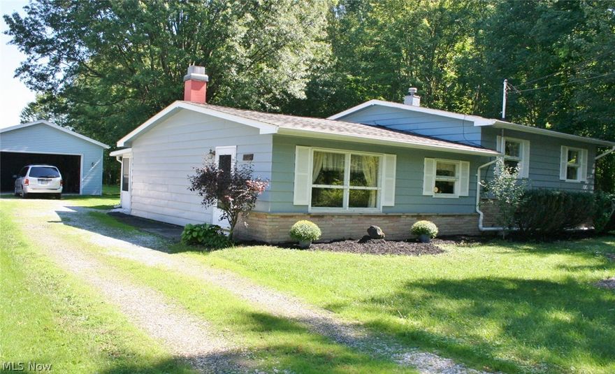 A lovely secluded three bedroom split level on over half an acre with nothing to do but make it your own! Where in North Ridgeville could you find this for $124,000? Right here! This home is ready for you. A charming living room with fireplace next to your kitchen which has a pass through window to the dining area. OR relax in the large screen porch next to the deck. Have the convenience a large utility/laundry/mudroom. Call now for your appointment.