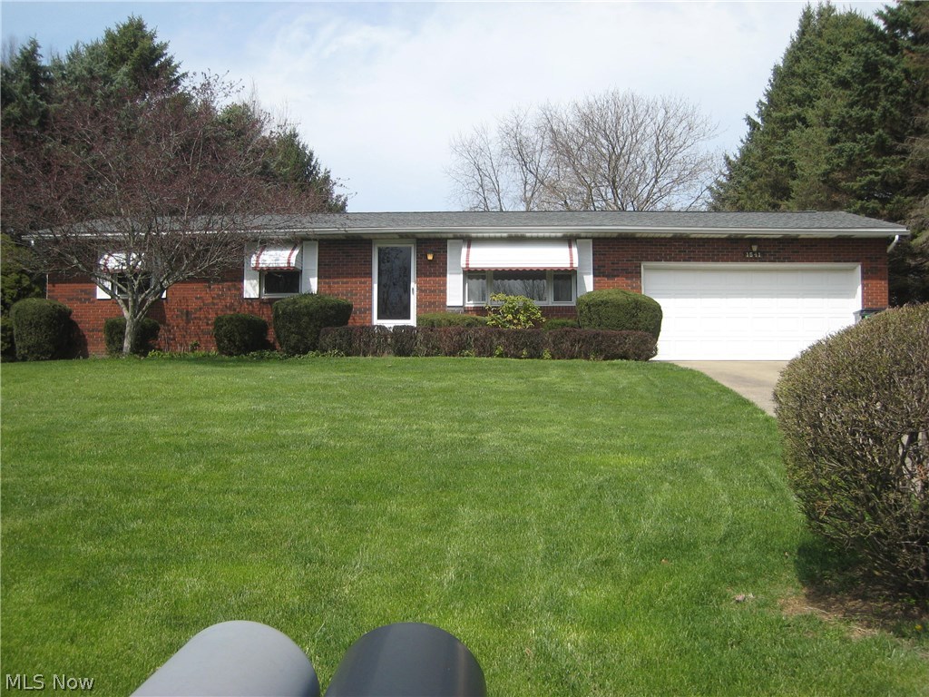 Custom built and meticulously maintained ranch located 5 minutes from 77, schools and the amenities of the thriving community of Green. The many updates of this home include pergo wood flooring, roof, upgraded electric, radon mitigation system and insulated steel front door. The open kitchen/dining room is great for entertaining and walks out to the 3 season porch overlooking the private yard. The 3 bedrooms offer plenty of closet space, and the master bedroom will accommodate your king size furniture. The lower level rec room adds an additional 516 sq.ft. of living area and features a bar and another full bath. Lots of built in shelving for storage and a workbench, too. All appliances stay including the washer and dryer.