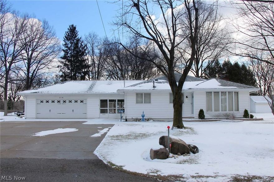 Well kept,charming 3 Bedroom Home.  Situated on a large Double lot, located tin the thriving Indianola Allotment, this 3 bedroom 2 bath home has much to offer. Close to shopping and restaurants with easy access to US 30 and I 77.  Large eat in kitchen with plenty of cabinet space.  Opened up living room and den combination complete with cozy, working fireplace and additional closet space featuring all natural woodwork.  Large Bay window for plenty of light. 3 bed and 1 Bath all on the main floor  The basement features a 2nd kitchen and large area for storage as well as finished room which could be used for an office, rec-room or teen room,  and 2nd bath / laundry area.  Furnace, Air Conditioning , Aprilaire and high efficiency Filter new in 2015. New  30yr roof in 2015 including gutters, leaf gaurds, and downspouts. Vinyl siding for a low maintenance exterior.  3 car wide concrete drive to 3+ car heated, insulated garage w/bench.  3 season breezeway.  Large paved covered patio is attac