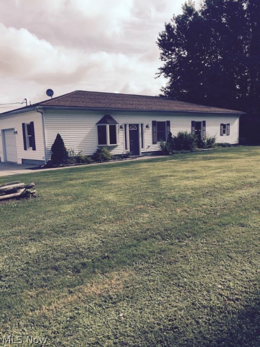 Great 3 bedroom Ranch on over an acre! Large eat-in kitchen, Living Room, Sun Room, 1.5 Baths. 1 car attached garage. Great for someone that has equipment for work. Extra large concrete area!