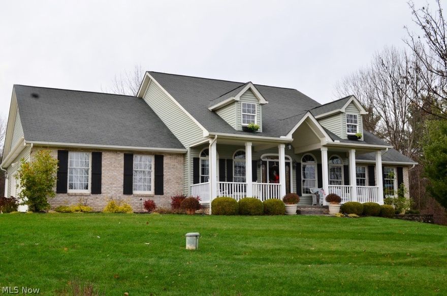 Wonderful ranch home, situated on 4.9 sprawling acres, boasts open floor plan with numerous amenities throughout!  Property showcases tranquil views and highlights ultimate privacy.  Welcoming, covered front porch leads to inviting foyer overlooking rooms beyond.  Elegant, formal dining room features arched entryways, decorative pillars, multiple windows, and tray ceiling.  Engaging great room offers double sided fireplace, crown molding, and ceiling fan.  Bright and open, gourmet kitchen presents expansive breakfast bar, extensive cabinetry, stainless steel appliances inc. double ovens, pantry, and separate eating area with hardwood floors.  Eating area opens to impressive sun room with sweeping ceiling, wall of glass offering panoramic views of rolling grounds, and sliders to yard.  Gracious master bedroom suite boasts alcove ceiling, large walk-in closet, and glamour bath with jetted tub, separate shower, and double sinks.  Two additional bedrooms and full bath complete main level.