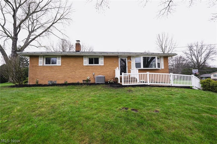 Welcome to this beautiful home! This charming ranch style home property features 3 bedrooms and 2 bathrooms, an attached garage and tons of space for comfortable living. The open floor plan and well-maintained interior and exterior make this home perfect for families or individuals looking for a cozy retreat.  Updates include refinished hard wood floors, natural stone in garage, doggie door with gravel pen 2019, two bonus rooms in basement (washer and dryer stay), updated landscaping 2024, 3 season room converted to full living space 2019, front drain line replaced in 2024, new HVAC in 2021. House is located super close to both Portage Lakes and Portage Lakes State Park!