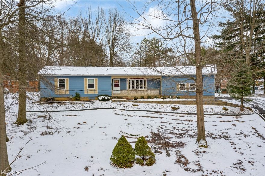 Now Look at This...1.59 acres of nature and seclusion nestled right in the heart of Jackson Township. If you are looking for something unique and special this 3 BR, 1.5 bath home might just be the unicorn you've been waiting for.  Updated kitchen with granite countertops and subway tile backsplash. First floor laundry. Great room ceiling soars with architectural detail and there is a gas fireplace to keep you cozy.  The three season room is perfect for enjoying the wildlife sanctuary that you get to call yours even though you are minutes from The Strip, The Shops at Nobles Pond, Schools and restaurants. Huge formal living room with newer bay window offers more space for your imagination to leap with possibilities. Primary bedroom with a half bath and 2 additional spacious bedrooms complete the first floor.  Explore more living space options in the lower level where you will find a recreation room and storage opportunites everywhere.  Fenced back yard. Newer brick sidewalk, porch and ba