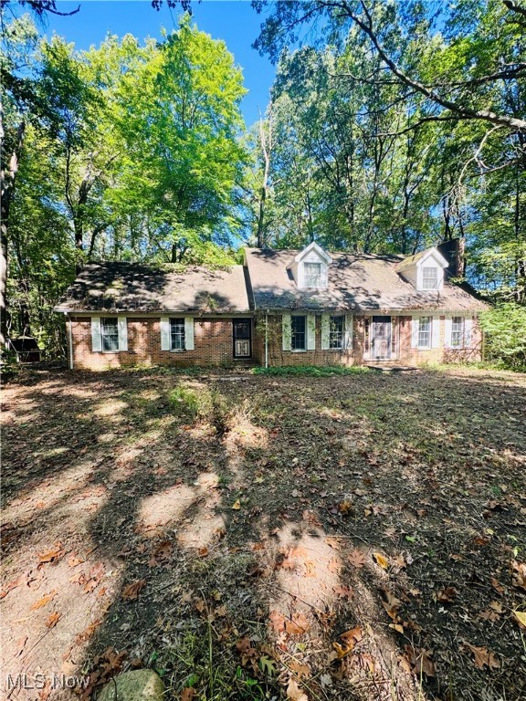 Attention investors: 3461 Mabel Ave in Ravenna is a solid brick home sitting on 3.69 private, wooded acres with serious potential. Featuring 2 bedrooms with the option to convert a third, 1 full bath upstairs and a half bath on the main level, this 1,888 sq ft property offers a flexible floor plan and a quiet, secluded setting just off the main road. The home needs significant TLC and is being sold as-is, making it a strong candidate for renovation or resale. Whether you're looking for your next flip, a buy-and-hold investment, or a long-term rental opportunity, this property checks the boxes: acreage, privacy, location, and value-add potential. Great upside for the right buyer willing to put in the work. Don’t miss opportunity in Portage County.
