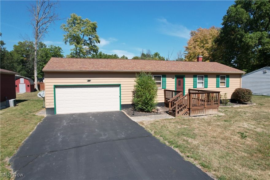 Welcome to this delightful ranch home offering single-floor living with three bedrooms, one full bath and a half bath, perfect for families or those seeking comfort without stairs. Flow through the main living areas into the kitchen, —ample counter and cabinet space, and room for casual meals or hosting. Downstairs, the fully finished basement adds versatile living space—ideal for a game room, home office, or extra gathering area. Step outside to your backyard retreat: a pool with a spacious deck where summer afternoons turn into memorable barbecues or evening sunsets. The two-car garage provides plenty of storage and protection for vehicles. With a layout that balances indoor and outdoor living, this home delivers both comfort and style. Lake Milton, Ohio’s 72nd State Park. Amphitheater, beach, swimming, fishing, boating, walking, jogging and mountain biking trails plus golf, wineries and shopping. Don’t miss the opportunity to make this ranch yours—schedule a tour today!