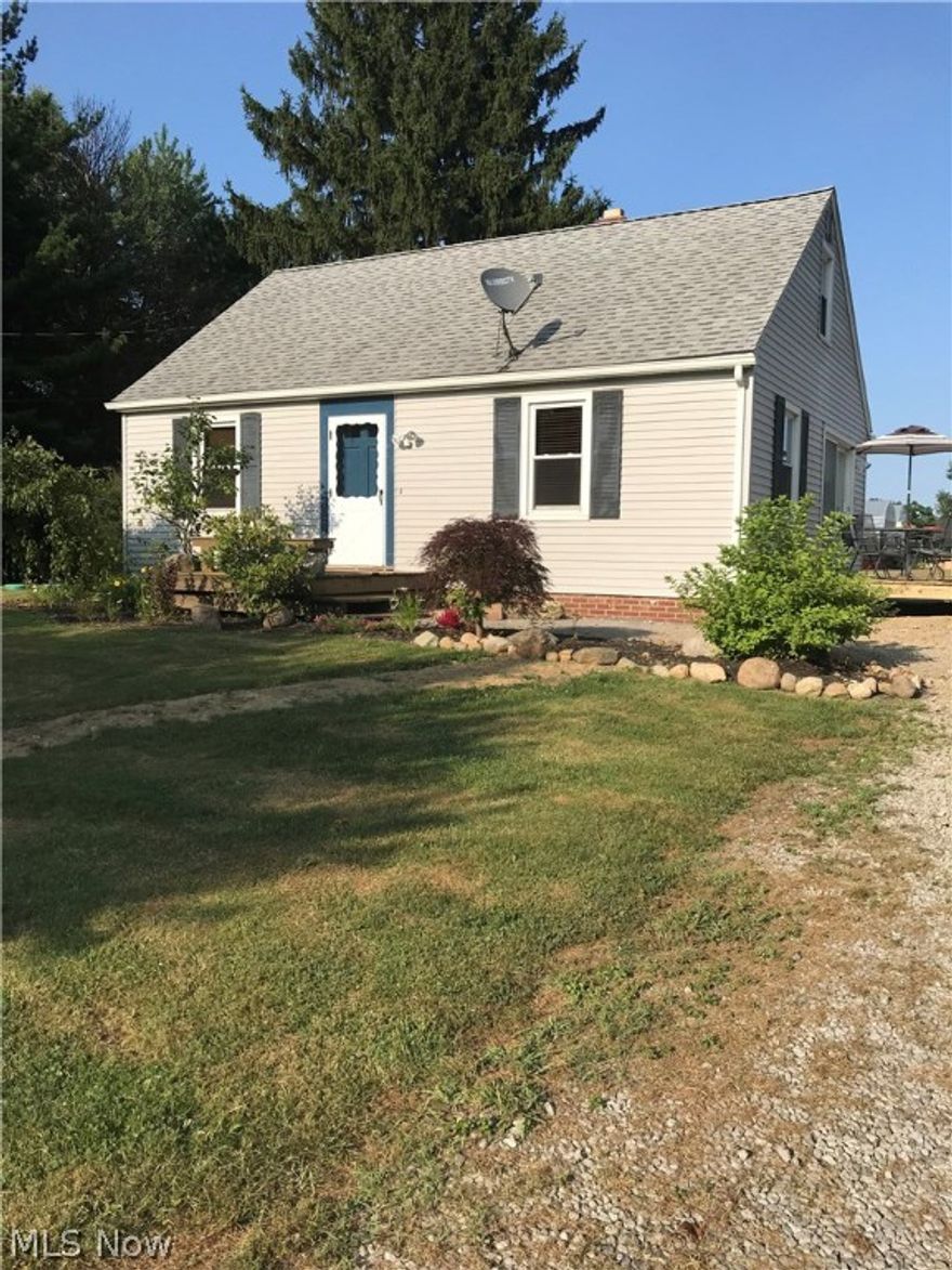 This lovely bungalow has many updates:  New pecks plumbing, pressure tank, submersible well jet pump,  Exterior drain lines, New septic system (2016), fully updated bathroom, glass block windows, water softener, newer windows, new blinds, refinished dining room floor, new carpet, freshly painted throughout, new copper connections, new filter, new vent pipe for oil tank, new frost proof exterior faucets, roof is less than 7 years old, new flashing around chimney, new wiring to garage.  

Additional plus' -- Trees include peach, pear, also grapevines, blackberry bushes, greenhouse, chicken coop. All on an acre of land.

New deck/patio off kitchen.