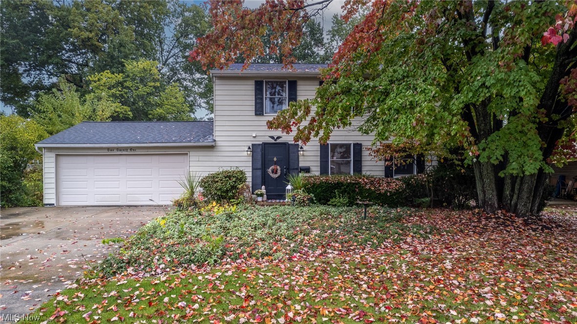 Situated in a well-established area of Niles, this home impresses immediately upon entry with its generous dimensions. The ground floor features a cozy, carpeted living and dining area. The family room, with its wood-burning fireplace and patio doors, opens up to an inviting outdoor area. The kitchen is well-appointed with stainless steel appliances and white cabinetry. Upstairs, the primary bedroom boasts an en-suite bathroom with a shower. The second bedroom offers substantial closet and floor space, while the third bedroom, originally two separate rooms, presents a spacious and flexible area for creative use. Outside, a large wooden deck provides an excellent space for entertaining, complemented by a level yard perfect for various outdoor activities, and a storage shed. This home is ready for viewing, so schedule your visit today. 1 year Guard Home Warranty provided.
