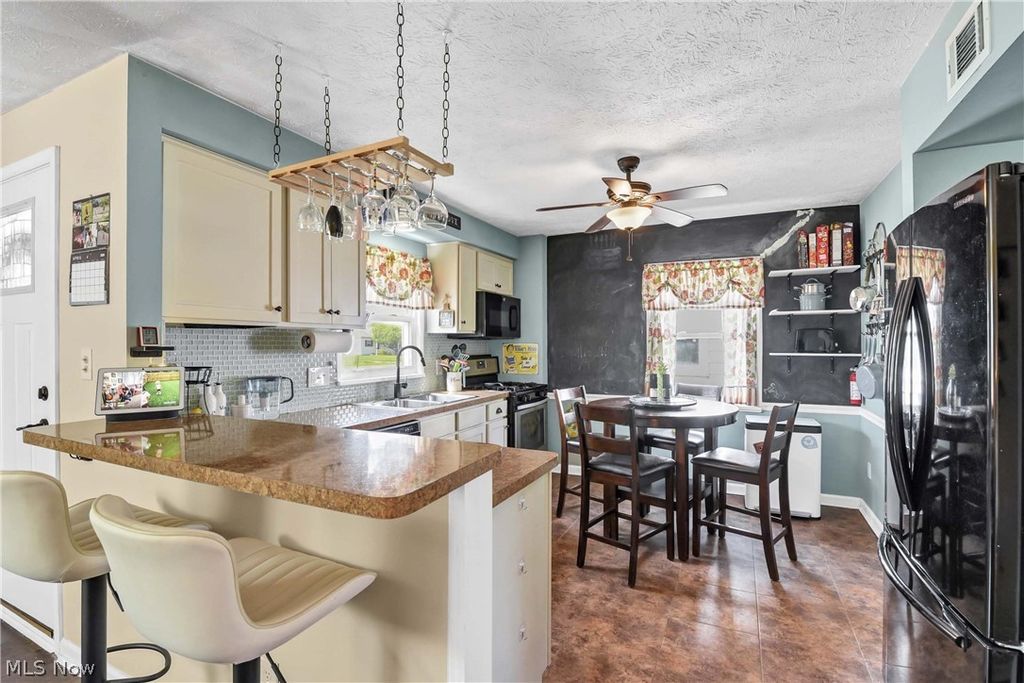 Photo of 5627 Burns Road, North Olmsted, OH 44070 (MLS # 5202397)