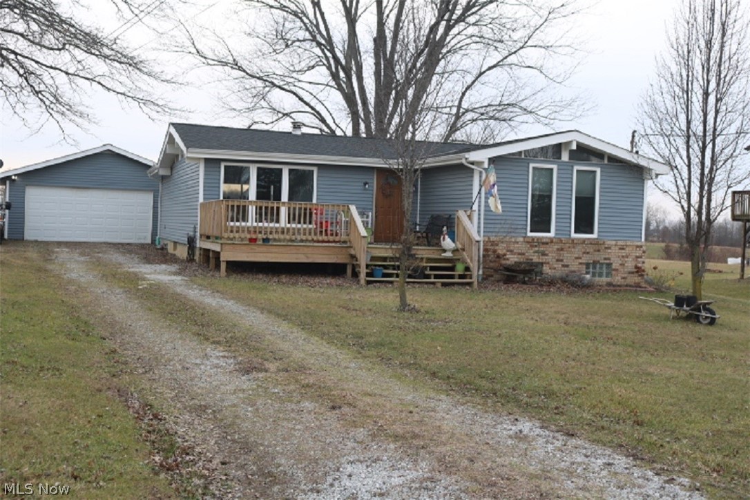 This home was the 2018 Ashland Board of Realtors Home Medallion Award runner up for home renovation. Updates aplenty including roof, siding, wood floors, furnace,heat pump, and windows. In the insulated basement is a walk in pantry and bonus room that could be used as an office or third bedroom. 90 minutes to Columbusand 60 minutes to Cleveland, this home provides access to a peaceful 135 acre lake stocked with a variety of fish and six miles of shoreline.