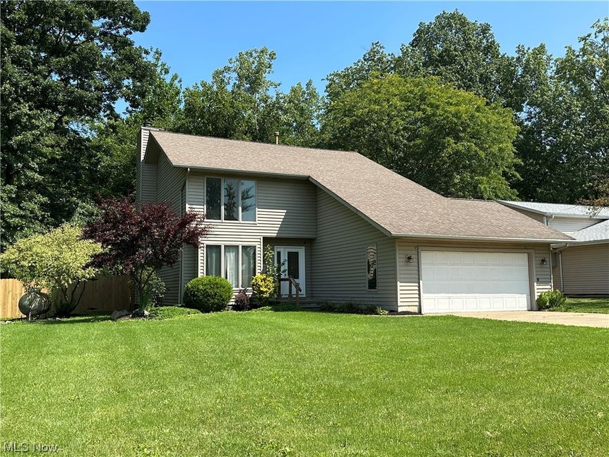 This home is ready for YOU!  The home features 4 bedrooms, 2 1/2 bath, a spacious kitchen with a large pantry and dining area.  3 of the bedrooms have walk in closets for extra storage with a Finished basement for added entertaining space and the beautiful yard is Fenced in with a Large back deck for outside living. 2 car attached garage and Shed for extra storage.