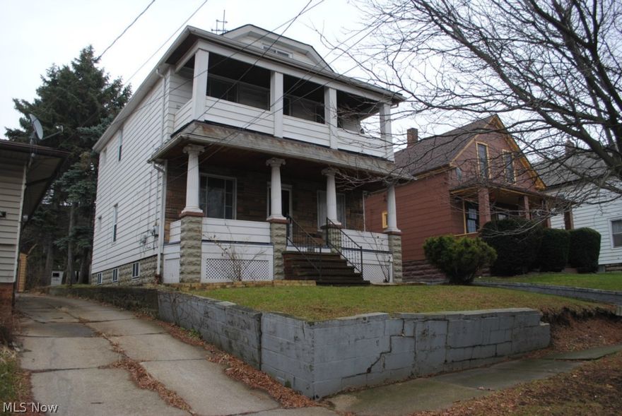 BANK OWNED .... Attractive Aluminum Sided 2 Family  With 2 Car Garage .... Two Bedroom Suites .... Some Newer Windows .... Separate Utilities .... Large Porches .... Desirable Street ....