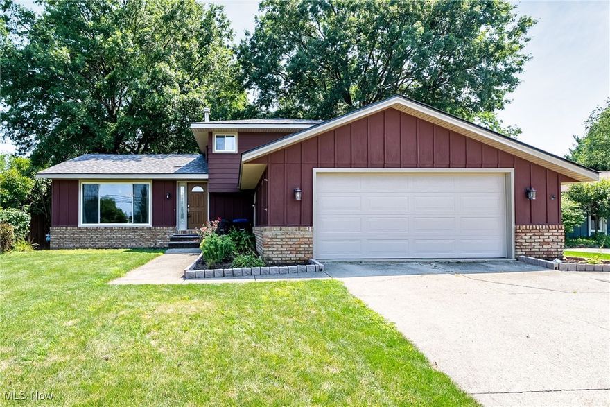 Step into this beautifully cared-for split-level home offering comfort, charm, and countless updates. Featuring 4 bedrooms and 2 full bathrooms, this home impresses with cathedral ceilings in the spacious living and dining rooms, filling the space with natural light and an open feel. Enjoy year-round relaxation in the expansive 3-season enclosed porch with durable Miracle Stone flooring, overlooking a private, fenced backyard—perfect for entertaining or unwinding in peace. Major updates bring peace of mind, including a brand-new roof, soffits, and gutters (2025), plus a brand-new furnace and A/C (2025) for year-round comfort. Cozy up in the lower-level family room with beamed ceilings and a gas fireplace, ideal for movie nights or gatherings. The 4th bedroom, located just off this space, currently functions as a home office—offering flexibility for your needs. Upstairs, you'll find the primary bedroom plus two additional carpeted bedrooms, all offering comfort and quiet retreat. Other highlights include HOA community pool, newer windows throughout and breathtaking sunset views from the main living room. This home is move-in ready with pride of ownership shining through every detail—schedule your showing today!