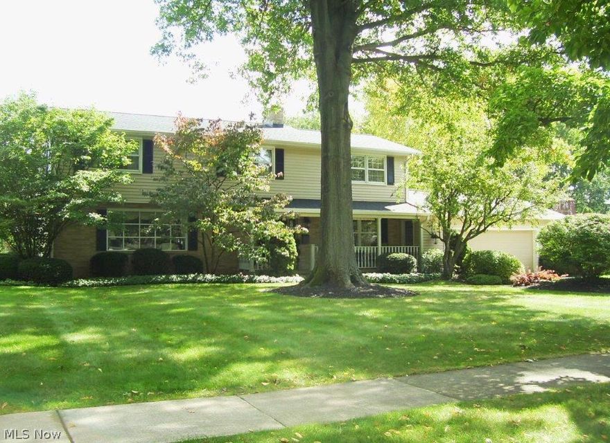 Charm, Warmth and Traditional Elegance describes this 3100 sq. ft. 4 bedroom colonial on a beautifully landscaped oversized lot! This home features 4 spacious bedrooms, 2 1/2 baths, tons of storage, study/family room with beamed ceiling and gas fireplace, brick wall and solid wood cabinets in fully applianced kitchen, formal living and dining rooms, solid cedar paneled rec. room with wet bar, commercial ice maker and refrigerator, a den with custom 4-B Wood Built in desk, built in storage in the unfinished section of the basement, an oversized 2-car heated garage and many, many updates throughout! This home has been lovingly maintained and awaiting new owners that will enjoy the quality, the spaciousness and everything that this warm and inviting home has to offer.