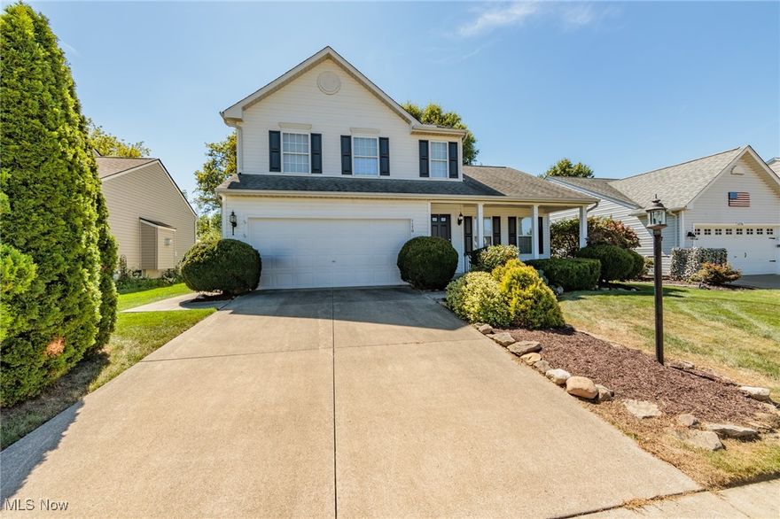 This charming 3-bedroom, 2.5-bath colonial home is nestled in the Weatherstone at Wadsworth development, offering a fantastic open floor plan and modern updates. As you approach, you'll be greeted by a welcoming front porch, perfect for sipping coffee on during these fall mornings. Inside, the spacious living room features large windows that flood the space with natural light, and a cozy fireplace adds a touch of comfort. The dining area flows perfectly into the renovated kitchen, with beautiful white shaker cabinets, granite counter tops, and subway tile back splash. Upstairs, the primary bedroom offers a peaceful retreat with an en-suite bathroom. The two additional bedrooms are generously sized, with plenty of space and share a well-appointed full bathroom. The home also includes a partially finished basement, perfect for a home office, gym, or rec room. The backyard features a spacious patio, ideal for outdoor entertaining, and a well-maintained lawn surrounded by mature trees. Located in a friendly neighborhood with easy access to Wadsworth schools, parks, and shopping, this colonial home in Wadsworth is a must-see!