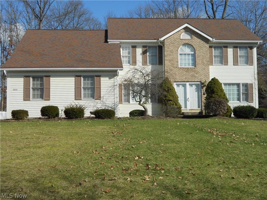 Beautiful custom built traditional colonial with spacious and flowing floor plan. Large eat-in kitchen recently updated with new appliances and granite counter tops and glass tile back splash. Large deck off kitchen with sliders, overlooks large and private tree lined yard. Open floor plan from kitchen to cozy family room with fireplace and vaulted ceiling. Loft over family room and is accessible from spiral staircase or main stairs. Large dining room has tray ceiling and opens to formal living room. Den/office area with french doors can also be used as a first floor bedroom. Beautiful wood molding throughout. 3 full and 1 half baths. Second level has 3 roomy bedrooms plus the large loft area that can be easily converted to 4th bedroom. Full, finished basement has full bath and bar area and offers much potential for additional living space. Three car garage and storage shed in back. One owner well maintained home. Close to schools, shopping, parks & entertainment. Add your own decorati