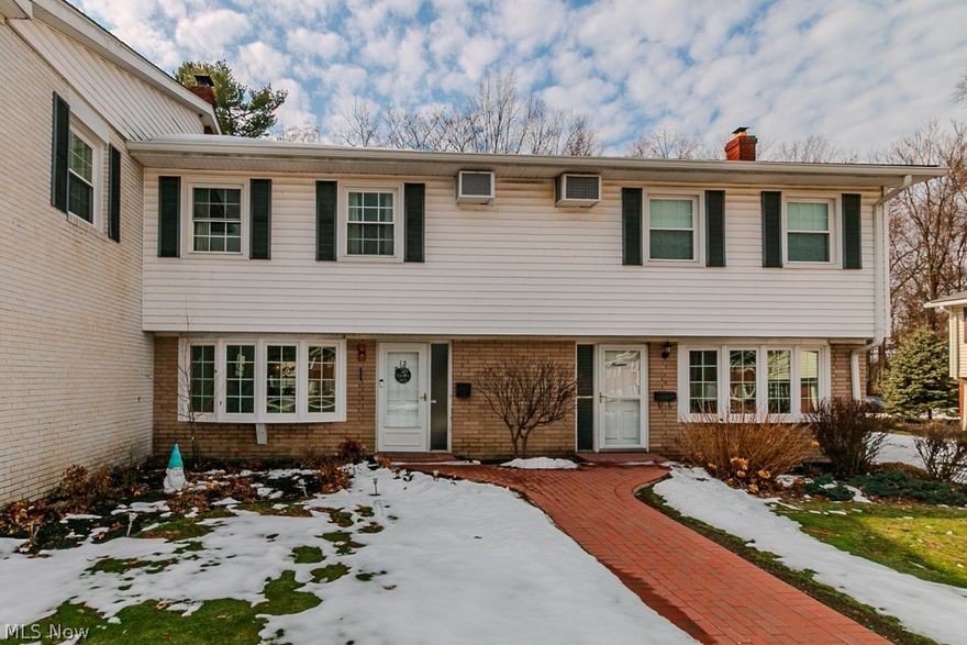 Welcome to this charming 3-bedroom, 2.5-bath condo located in the desirable Meadowlawn community in the heart of Mentor! This home is move-in ready and full of warmth and character.

The main level features newer wood laminate flooring and a spacious living room highlighted by a beautiful bay window (installed in 2020), custom built-ins, crown molding, and a cozy wood-burning fireplace. The dining area flows seamlessly into the kitchen, which comes complete with all appliances, making everyday living and entertaining effortless.

A flexible family room or home office provides additional living space and opens to a private brick patio. The perfect spot to relax or entertain guests.

Upstairs, you'll find three generously sized bedrooms, including a primary suite with a walk-in closet and private full bath. A two-car heated attached garage adds convenience and extra storage.

Enjoy Meadowlawn's community amenities, including a pool and playground, all while being just minutes from shopping, dining, and everyday conveniences.

Don't miss your opportunity to call this one home!