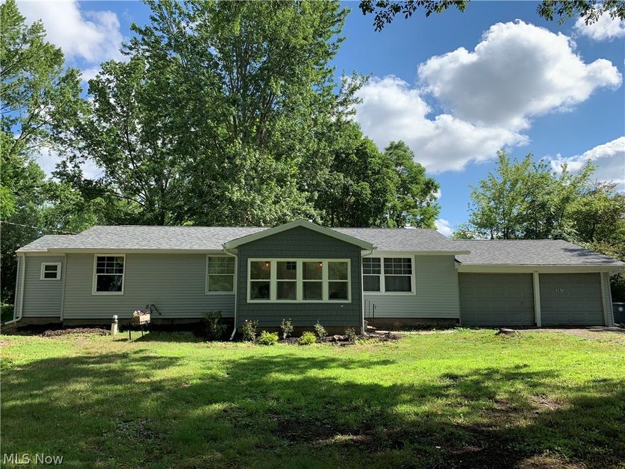 Welcome home to this beautifully updated ranch. Enjoy a bright, airy kitchen with new cabinets, counters, dishwasher, range hood, disposal,  large enough for a small island/additional workspace to host gatherings for family & friends. Also brand new are the A/C and furnace, and tankless hot water.  Tear off and re-roof in July 2023, as well as new windows and doors. New floors and paint throughout.  Bathrooms have new fixtures, vanities, and tile floors.  See yourself in the comfortably decorated interior with its muted tones, fresh paint, and many unique custom features, including the built-in entry.  
Garage door recently maintenance, and in proper working condition.  
Situated on just over 1 acre, enjoy watching a quiet rain or soft snowfall from the enclosed porch or host parties on the rear patio, with enough space for large gatherings, and don't forget the fenced in private yard. This home is located just .5 mile from Oberlin College, convenient shopping, dining, walking the campus.  Enjoy all that the Oberlin community has to offer.  
1 Year Home Warranty included. Schedule your showing today!
