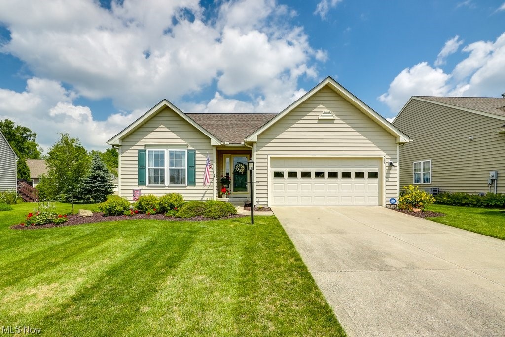 Enjoy the ease of single floor living in this stunning and fully updated 3 Bed/2.5 Bath ranch home located in the desirable Brandywine Preserve subdivision! You’ll love this open and bright floorplan with plentiful windows, neutral paint, beautiful hardwood floors, 2 car attached garage with newer garage door (2023) & man door (2022). The updated kitchen overlooks the inviting living room with vaulted ceilings, and it features a large walk-in panty and stunning quartz countertops, updated backsplash, newer KitchenAid stainless steel appliances, crown molding on the kitchen cabinets & a newer Moen faucet (2022). The dining room leads out to the large low-maintenance TREX deck and paver patio overlooking the lush backyard. The Master Bedroom features an en suite bath and walk-in closet. Two additional bedrooms, a 2nd full bath, and a convenient laundry/mud room between the garage and kitchen complete the main level. The partially finished basement includes a rec room that features both