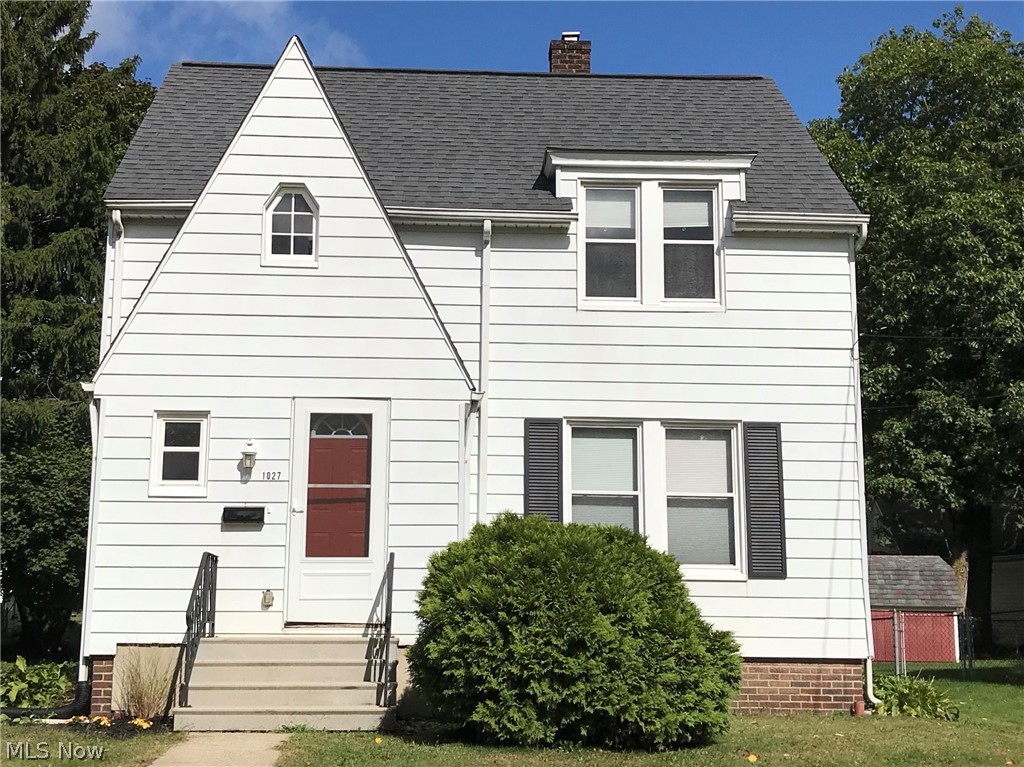 Charming 1940 Cottage-style colonial in Kent, Ohio... Just a short walk to elementary school, trails, parks or downtown Kent. Stunning original dining room built-ins, original woodwork/hardwood, front entry with coat closet and larger-than-expected living room that flows into dining room. Cleaned & resurfaced hardwood (in 2018) is everywhere except kitchen/bath! Fresh coats of neutral or trending paint color throughout so just turn the key and create the color palette you want with furnishings and accessories. Blinds in each room stay. Gorgeous woodgrain-clad vinyl windows match original woodwork & were replaced in 2002 by Neighborhood Development. Roof replaced in 2008. Electric panel and service upgraded. Rear deck is ready for your enjoyment on those sunny fall evenings! Bathroom boasts new cabinet, sink and toilet, 2020. New water heater in 2019; fresh ceiling paint and select rooms 2020. On-trend LVT in kitchen, 2020. Dates of other improvements and mechanical replacements are ava