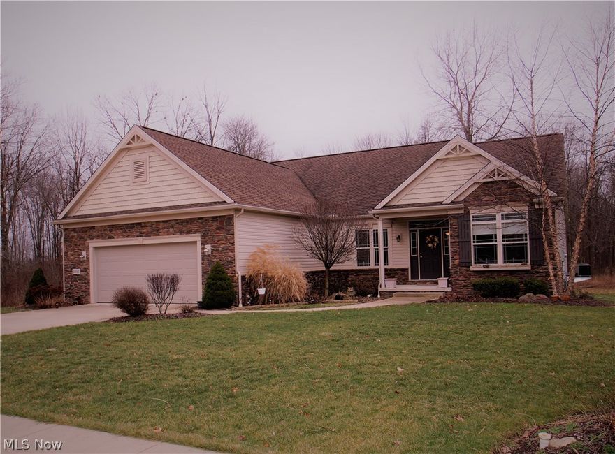 Stunning 3 bedroom Ranch, located in Highland Reserves, built by Reflection Homes in 2008. Come take a peek at over 2,000 sq ft of quality!
This one has it all......... Fenced back yard, 2 sides are wooded.  Open floor plan with Master bedroom on one side of the home and the other 2 bedrooms on the other side of the home.  Professionally designed and constructed back yard with many desirable features: iron fence, stone fire pit, pergola, storage built in under the sun porch, and much more.